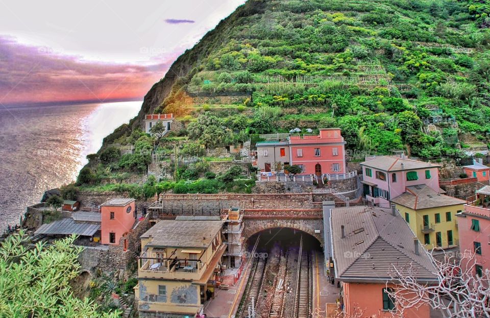 Tunnel at sunset . A train tunnel through the mountains in the Cinque Terre at sunset 