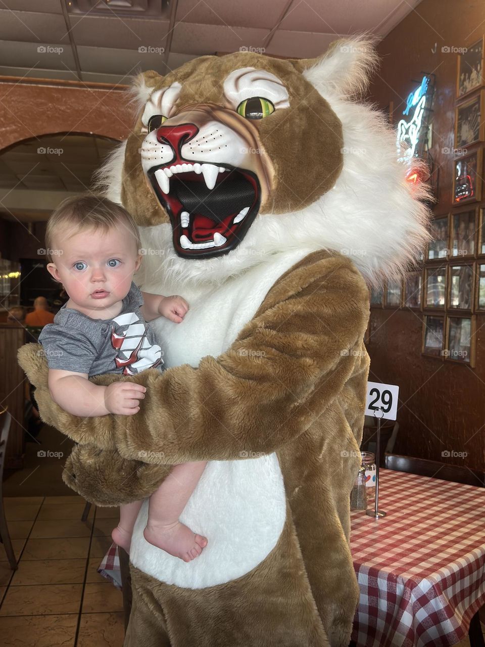 Baby with mascot