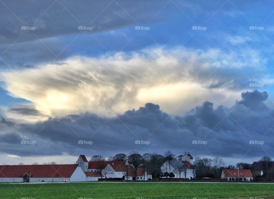 Big clouds over monastery