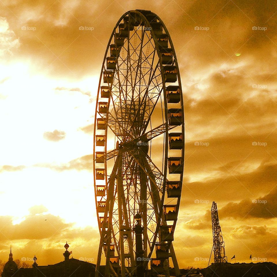 Ferris wheel. A Ferris wheel in Paris December market 