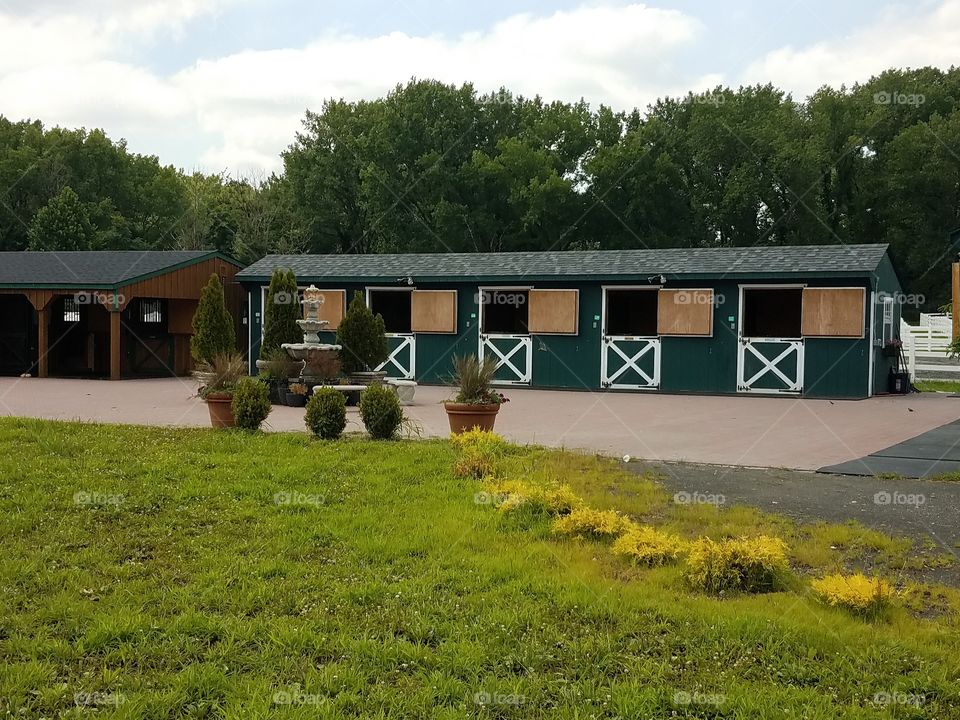 Outside stables at an equestrian farm.