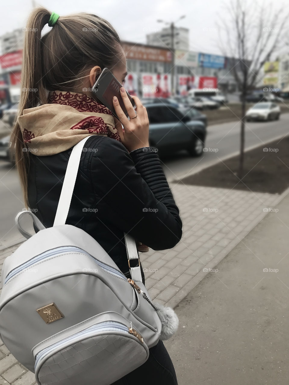 Young woman using mobile phone 