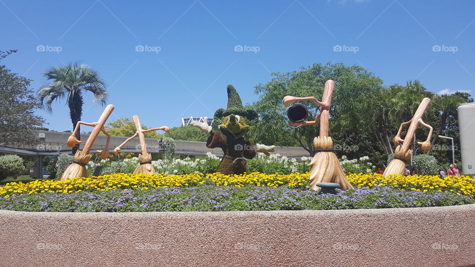 Sorcerer Mickey brings his companions to life at the EPCOT Flower & Garden Festival at the Walt Disney World Resort in Orlando, Florida.