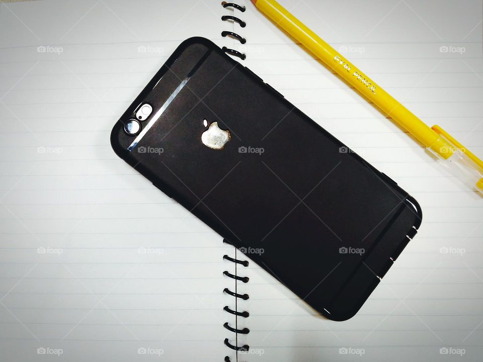 i-Phone with Pen and Notebook