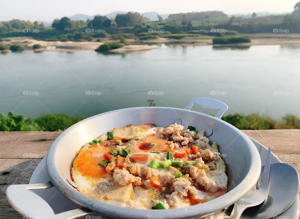 egg pan at  river side in the morning