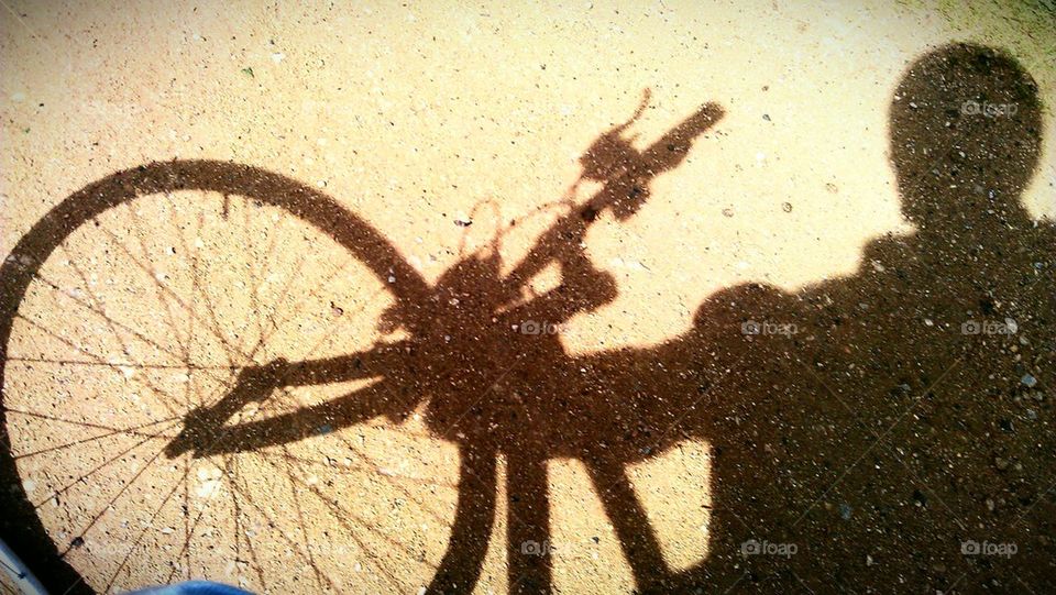 cyclists's shadow