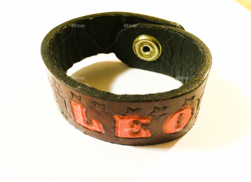 Handmade leather bracelet with leo sign