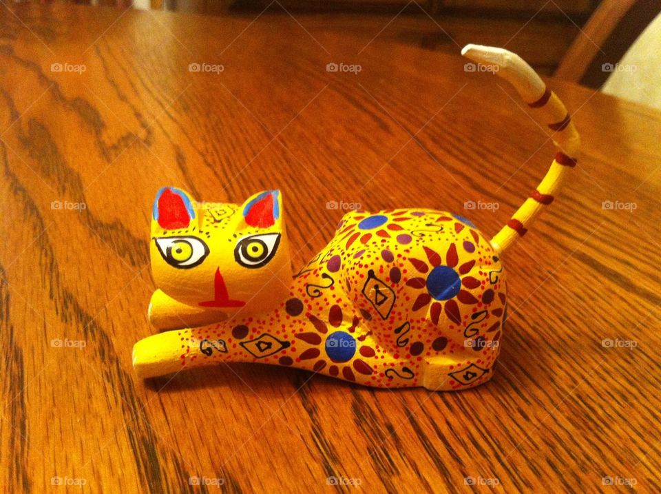 Oaxacan Wooden Cat . The art of Oaxacan wood carving is a spiritual process. The soul of the creature is seen in the wood and then released.
