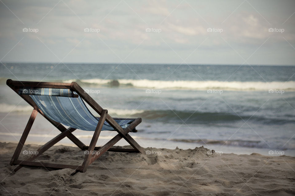 beach of chair travel by fostertown