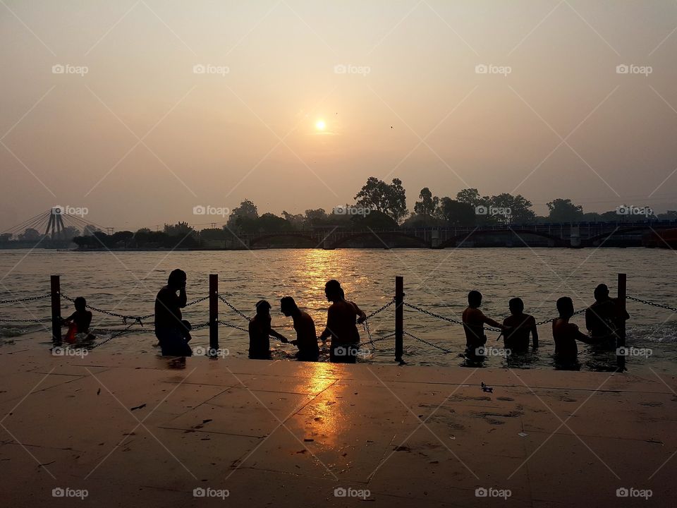 bathing at ganga river at haridwar,india