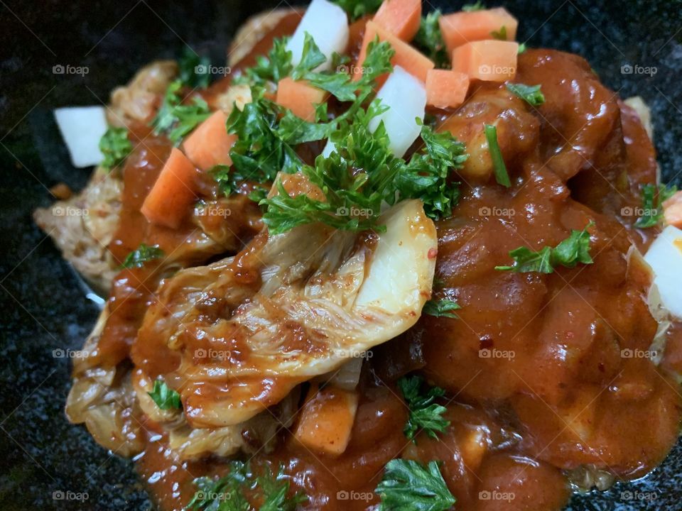 Kimchi salad with kimchi savory source