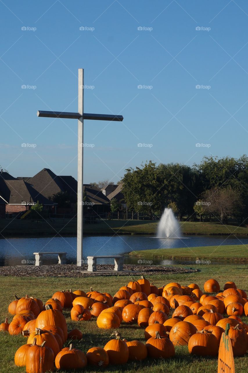 Cross and pumpkins. Photo taken at pumpkin patch for missions outside the First United Methodist Church in Owasso OK.