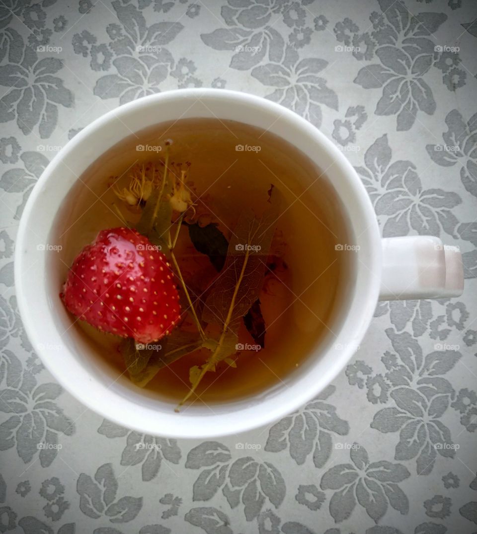 Relaxation with a cup of linden tea