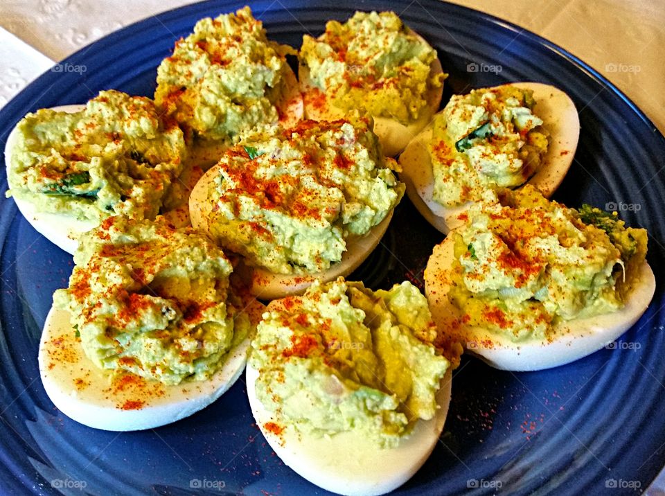 Avocado Egg. Hard boiled egg stuffed with egg/guacamole mixture