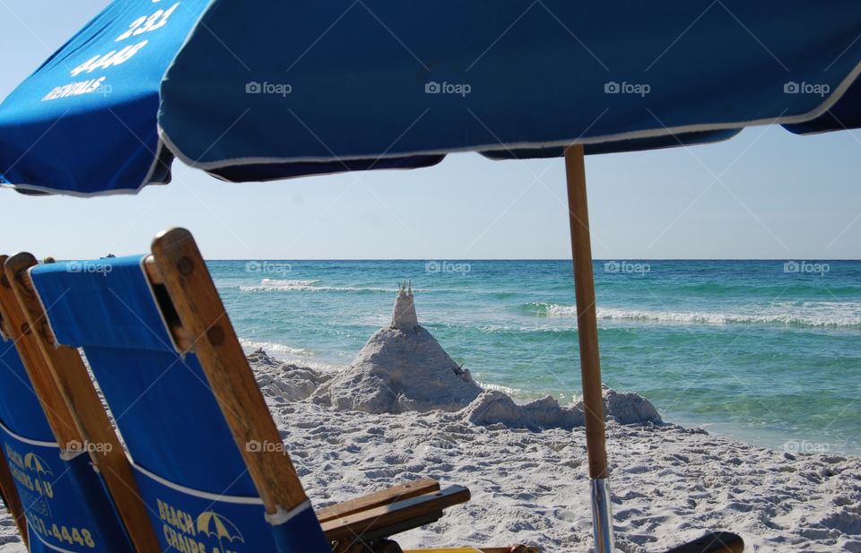 Umbrella at the beach. Relaxing at the beach