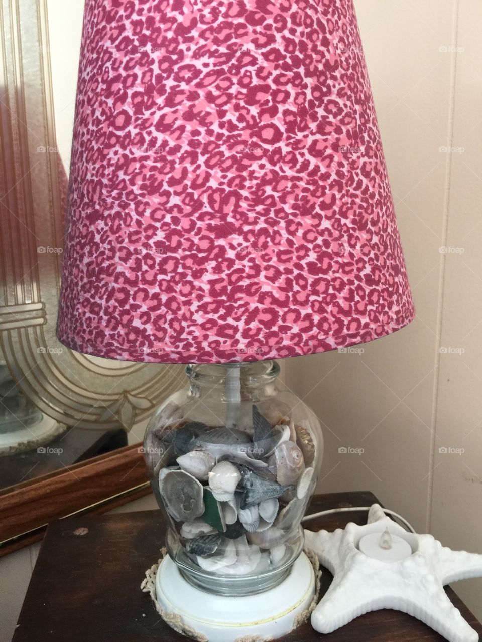 Collection of shells in a Pretty in pink shade and glass lamp