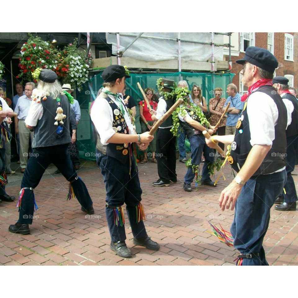 Men perform a traditional fertility dance at the Faversham hop festival