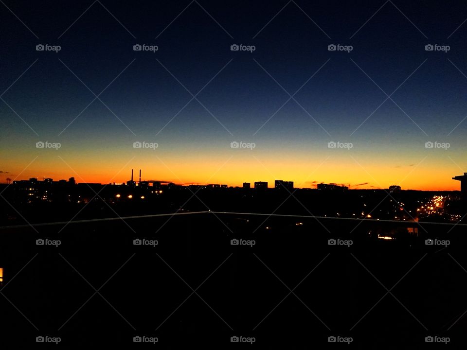 Silhouette of buildings during sunset