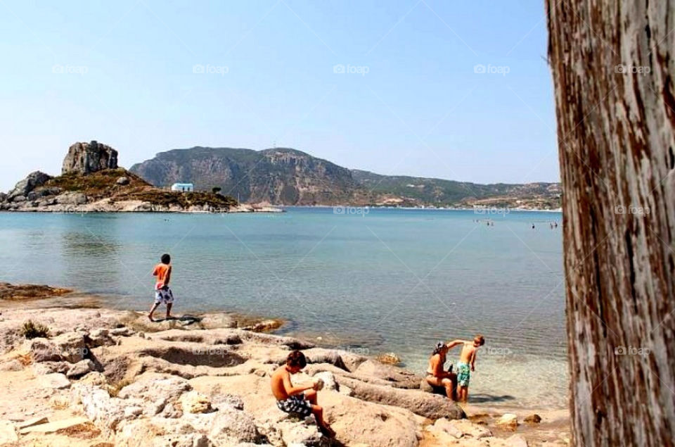 beach people children play by merethe