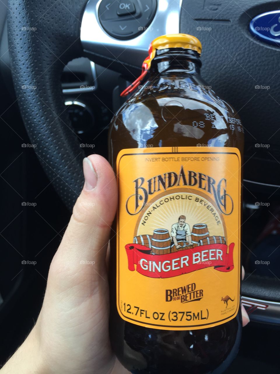 Bundaberg. Hand holding ginger beer