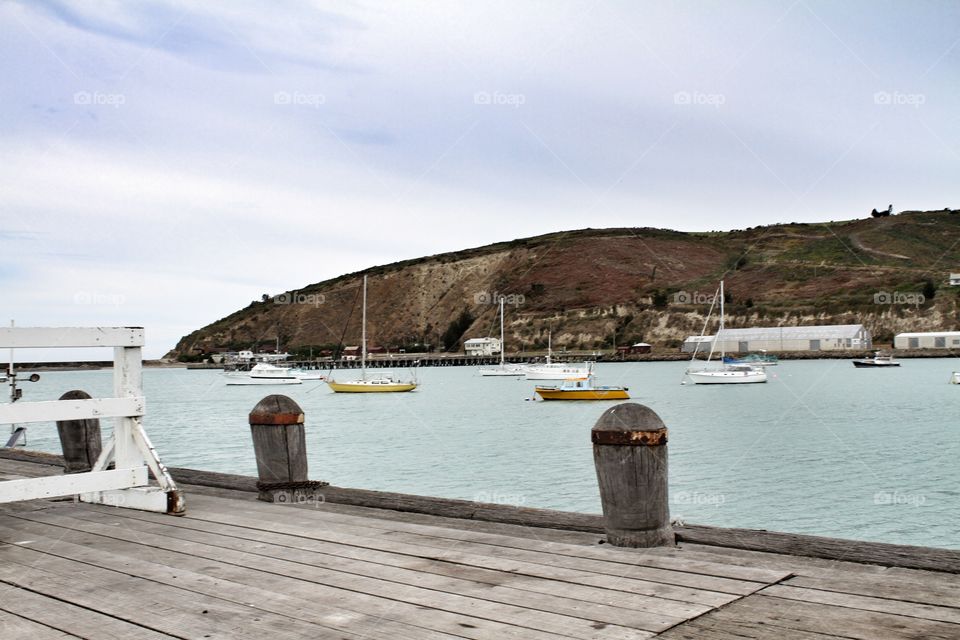 Boats in harbour jetty