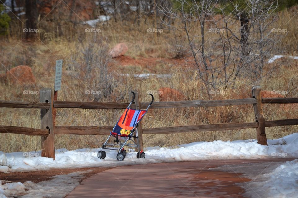 Waiting for Baby. Child's stroller in Garden of the Gods state park