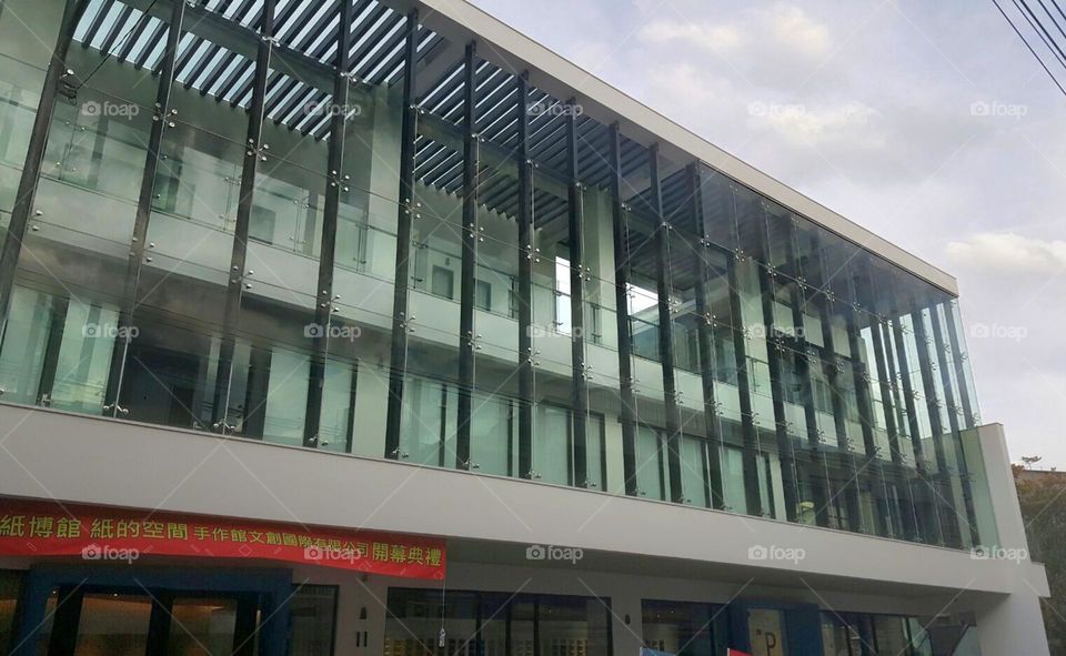 PAPER MUSEUM, a white building with glass curtain