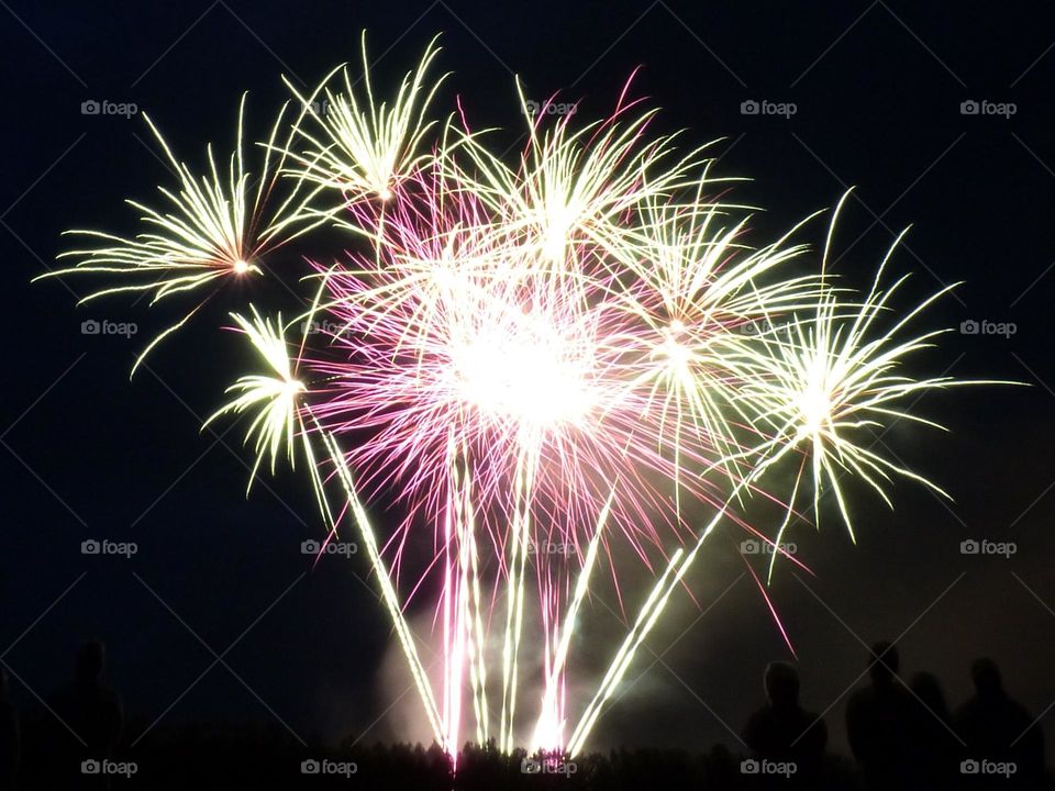 In France, the July 14 firework celebrates the national day and bring the French together around festivities. This photograph was taken in 2023 in a small town.