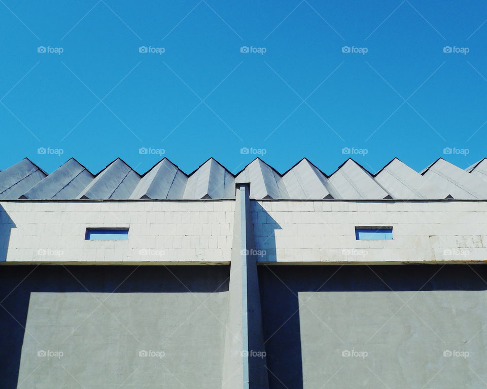 roof of a building against a blue sky