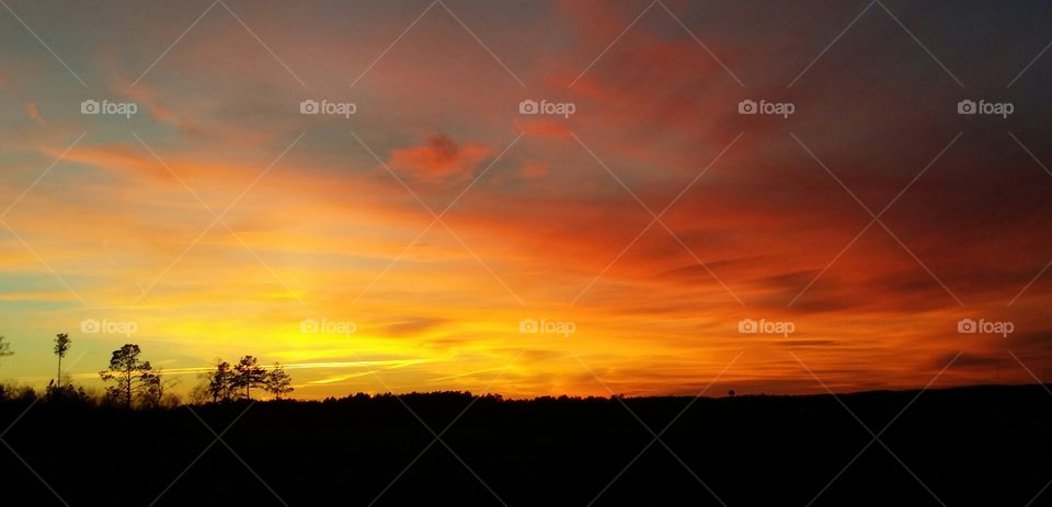 Fire in the sky. another time I pulled over in traffic to take a picture. this was sunset.