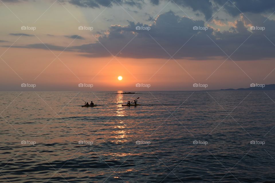 Greece Sunset beach canoeing. Greece Sunset beach canoeing