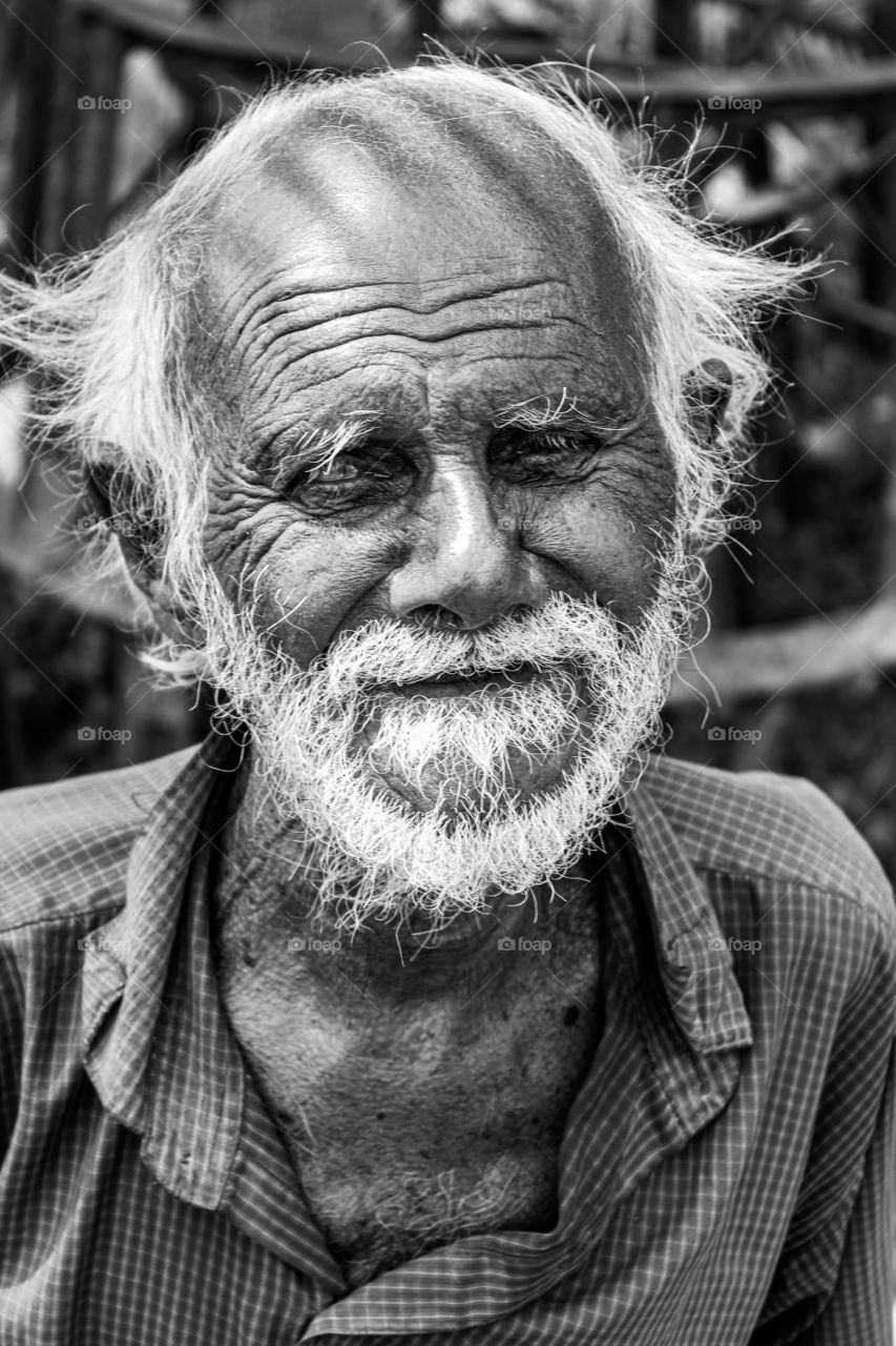 He is named PERIYASAMY who was so stubborn by doing help to others and get some incentives.. I compromised him to give money because i got his portrait... #portrait of poverty