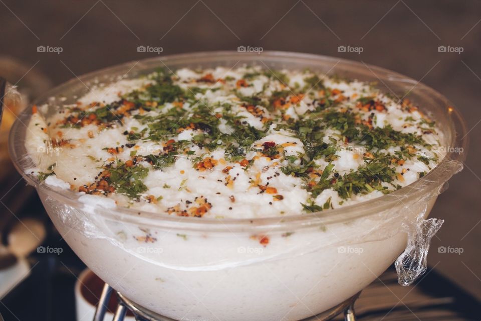Curd rice garnished with mint and curry leaves a daily staple from India