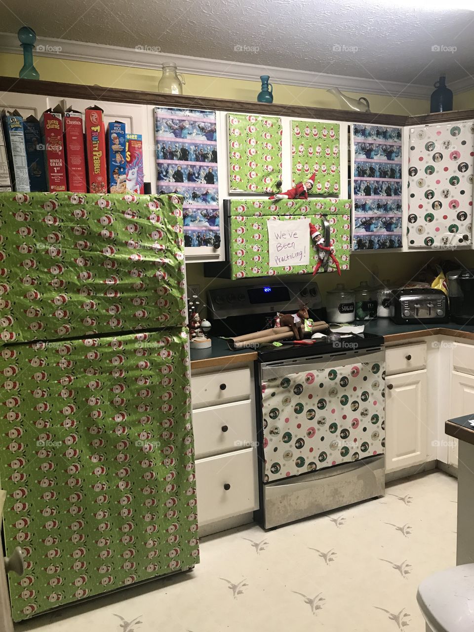 Our magical little elves from the north pole decided to gift wrap our entire kitchen. 