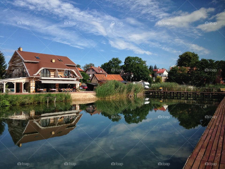 countryside and reflection on the lake in Poland