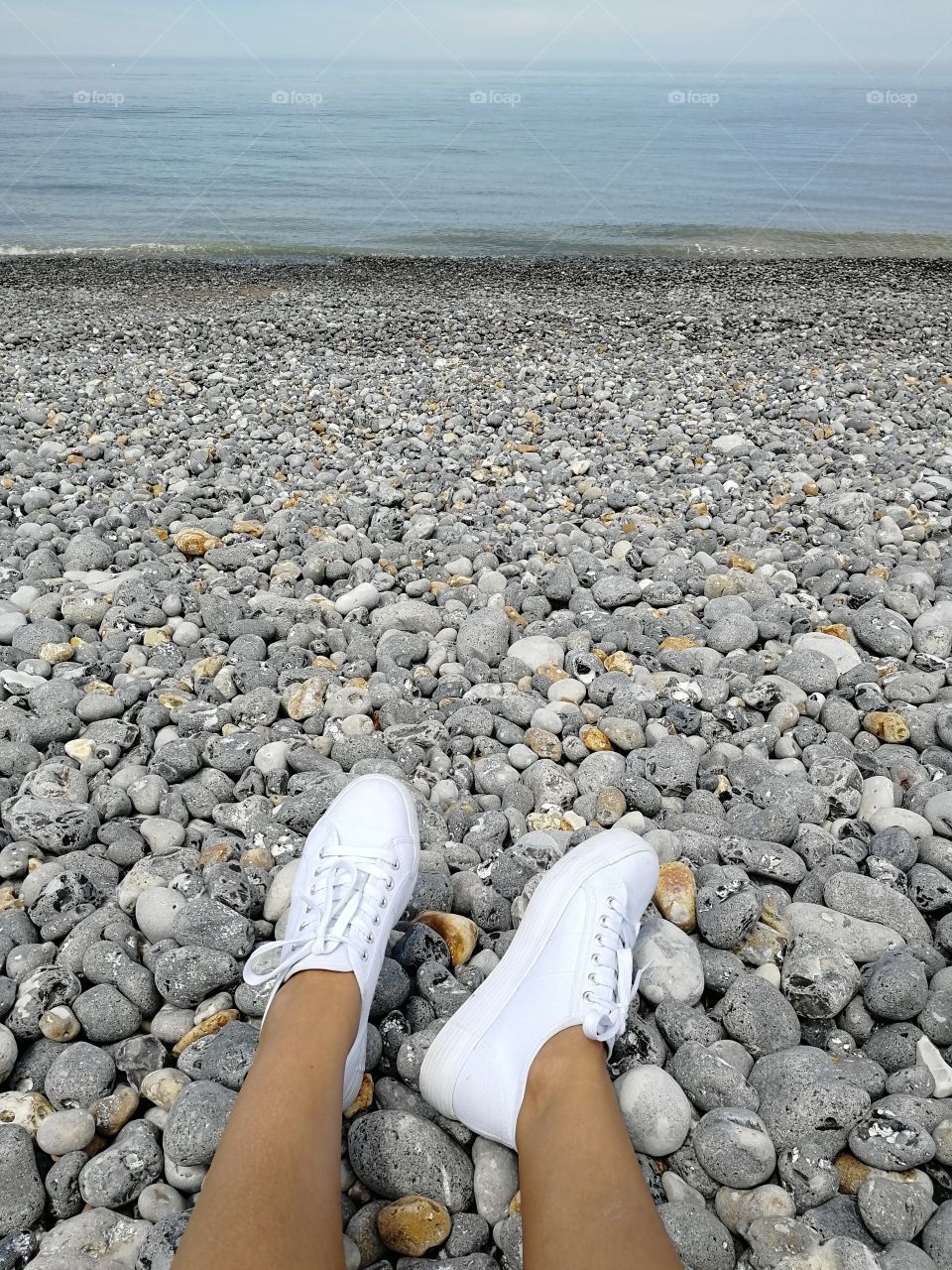 White shoes on rocks