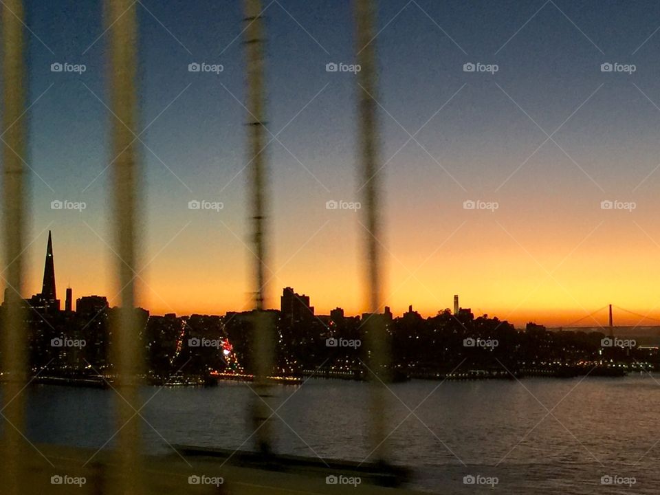 Sunset from bay bridge to Golden Gate Bridge 