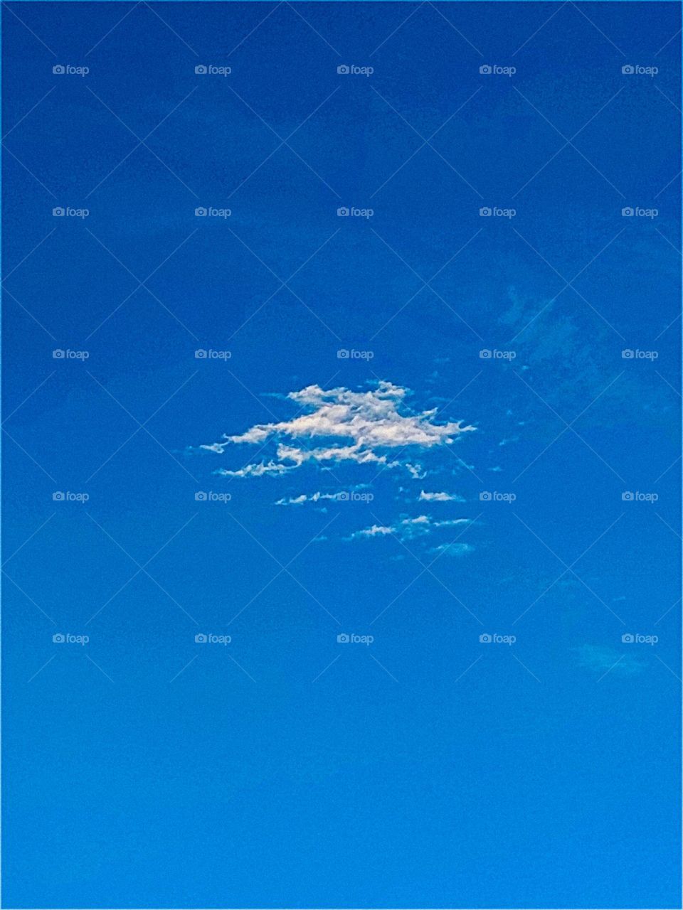 I want to show white clouds and blue sky in this photo.  The sky looks very beautiful with clouds and blue sky.