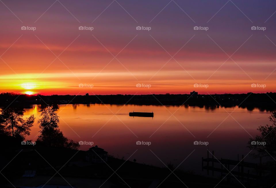 Dramatic sky reflected on lake