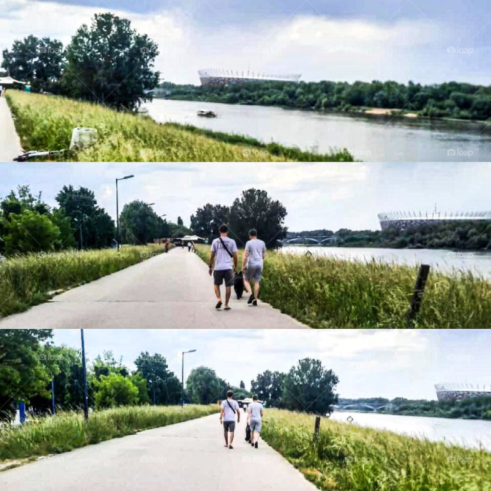 Riverside Walkway with Stadium in the Distance