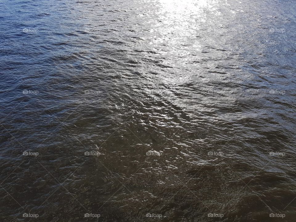 River Thames surface.