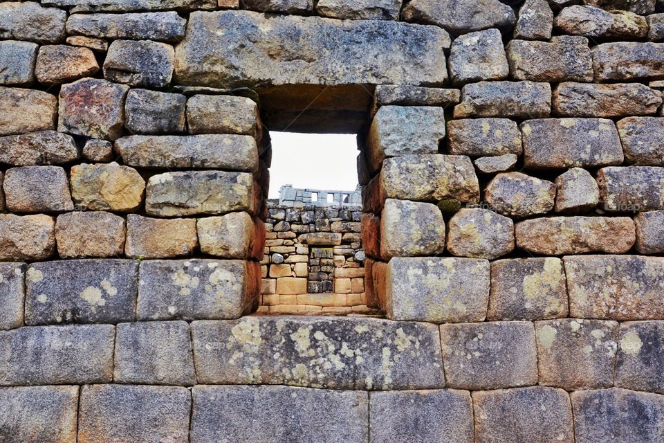 Looking through the windows at Machu Picchu 
