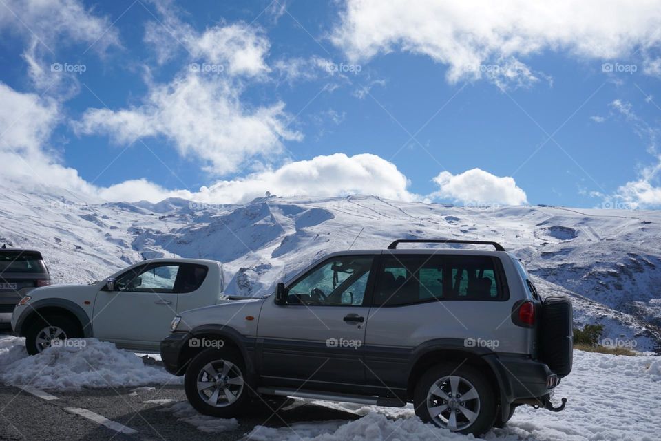 Cars#mountains#winter#clouds