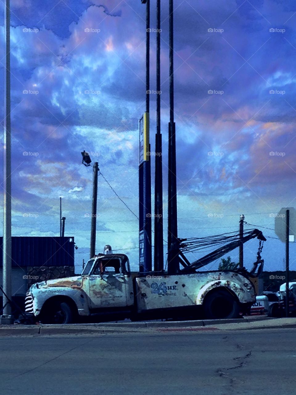 Tow truck & clouds