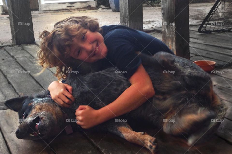 Boy and his Best Friend Play Fighting