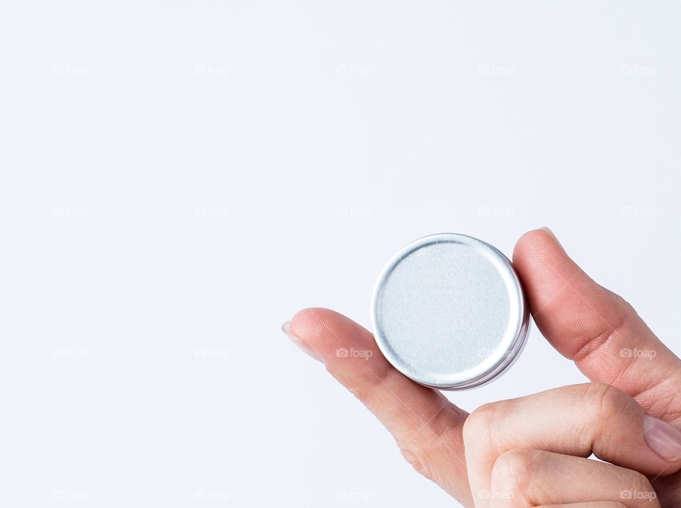 woman hands holding beauty products