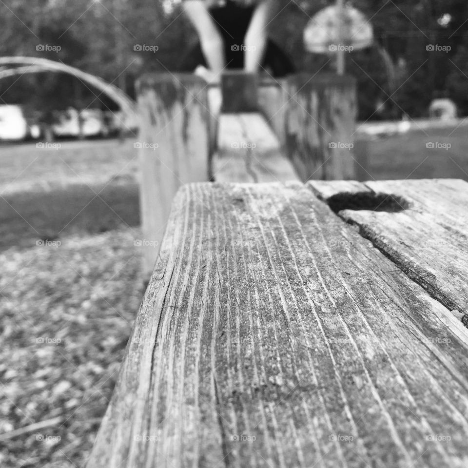 Board with tree background black and white