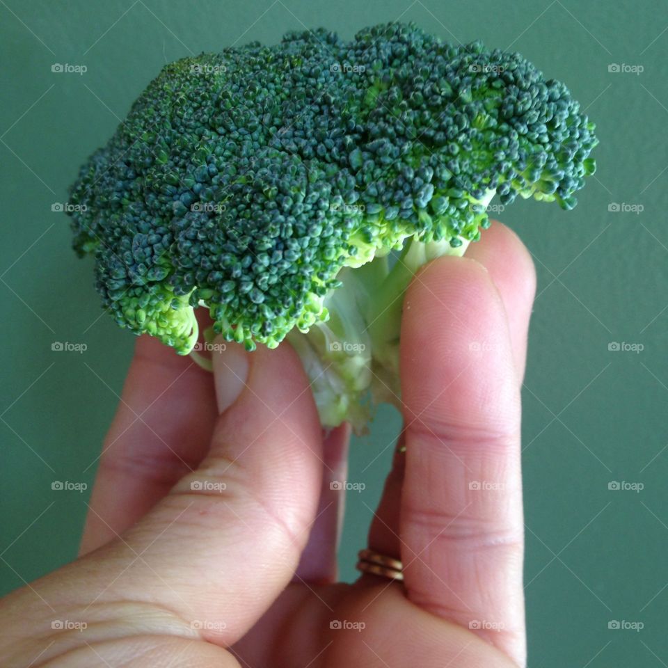 Holding broccoli 