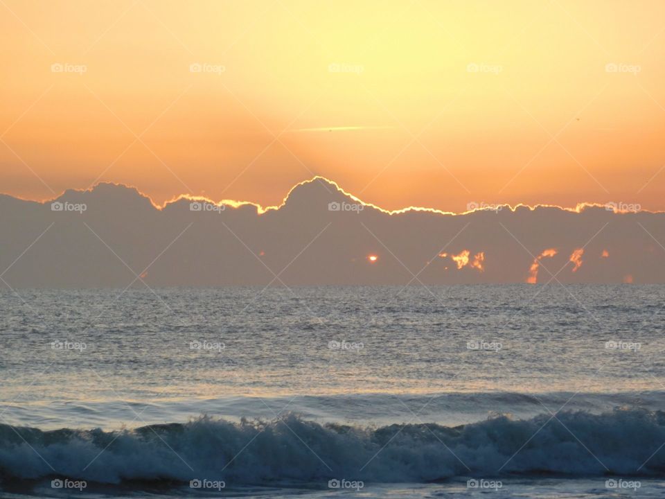 sunrise on the beach, clouds