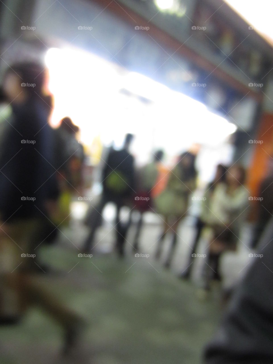 Blur. Fashionable People in Tokyo, Night View. City Life.  Urban Cityscape